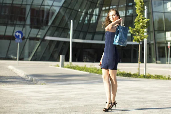 Young woman after shopping — Stock Photo, Image