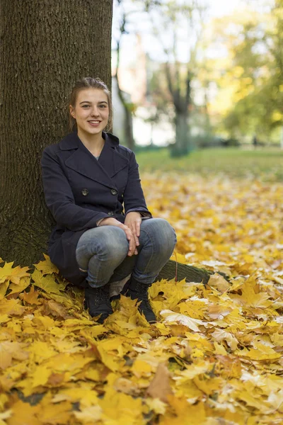 Young sitting girl — Stok fotoğraf