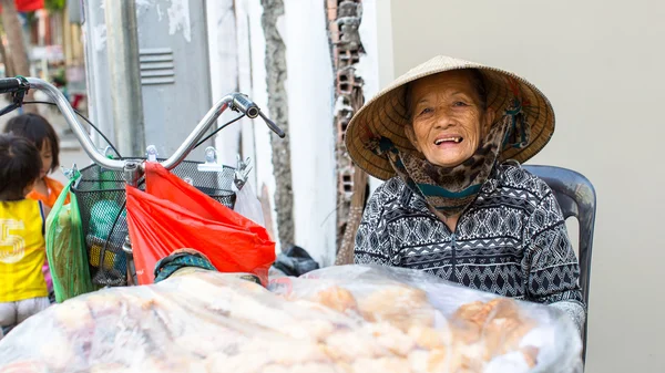 Local woman street vendor — Stock fotografie
