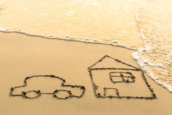 Haus und Auto Zeichnung am Strand Sand — Stockfoto