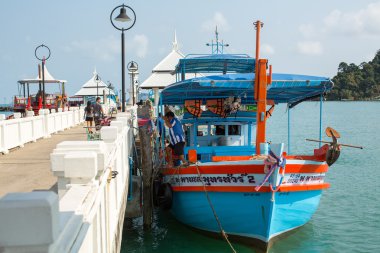 Tourist boat at the pier in Bang Bao