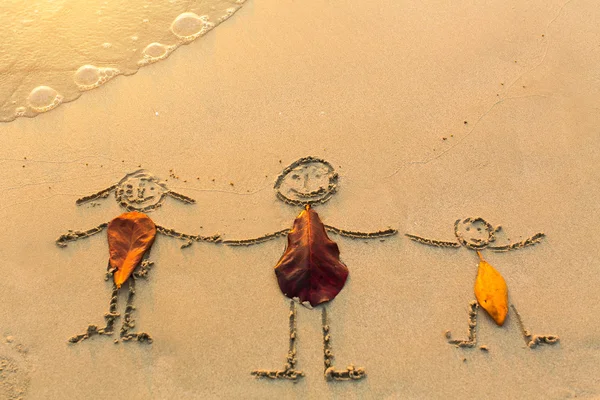 Family drawn on sand beach — Stock Photo, Image