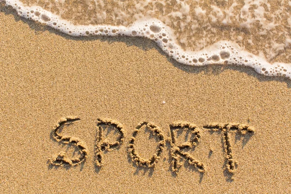 Inscripción deportiva en playa de arena —  Fotos de Stock