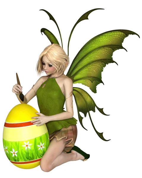 Blonde Fairy schilderen een Easter Egg — Stockfoto