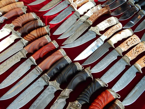 Background. Close-up. Texture. Knives with decorative handles. September, 2014.