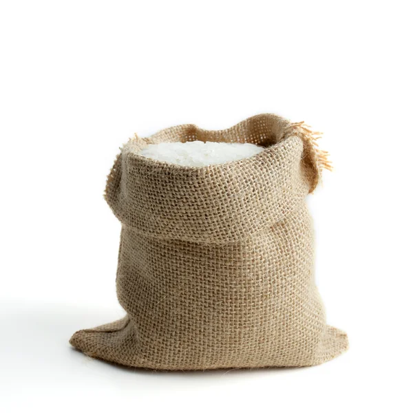 Rice in burlap sack — Stock Photo, Image