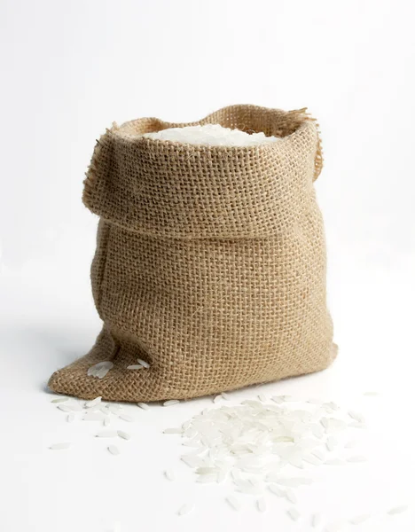 Riz en sac de toile de jute — Photo