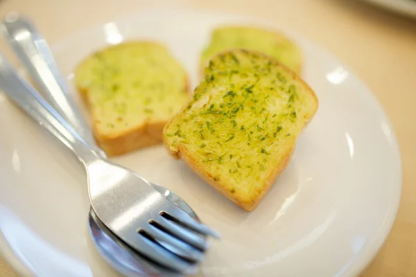 Usturoi și pâine din plante — Fotografie, imagine de stoc