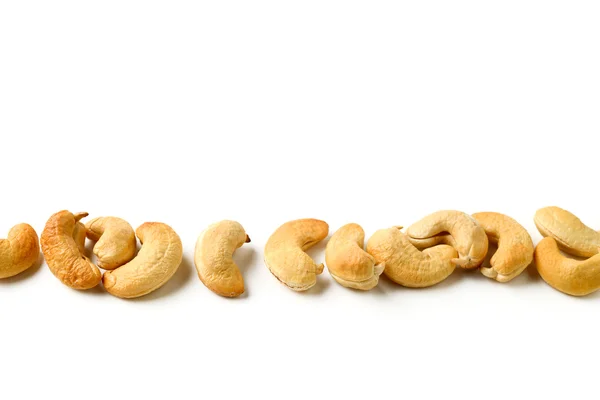 Row of cashews nuts — Stock Photo, Image