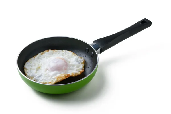 Fried egg in a pan — Stock Photo, Image