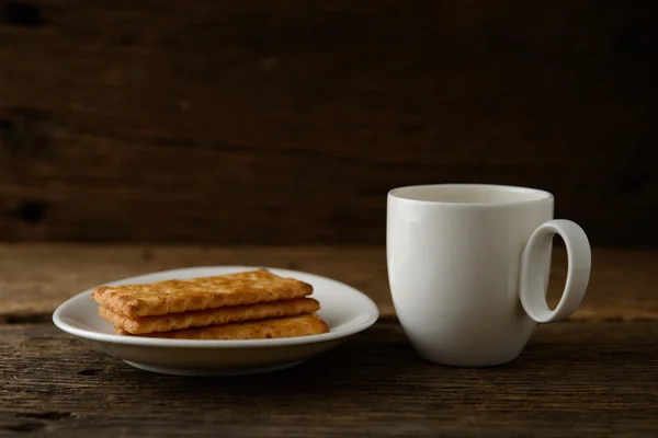 Coffee cup with biscuit — Stock Photo, Image