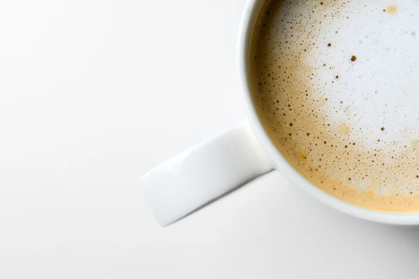 Cappuccino on a white table — Stock Photo, Image