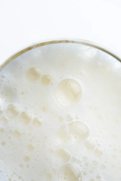 Froth of beer in glass — Stock Photo, Image