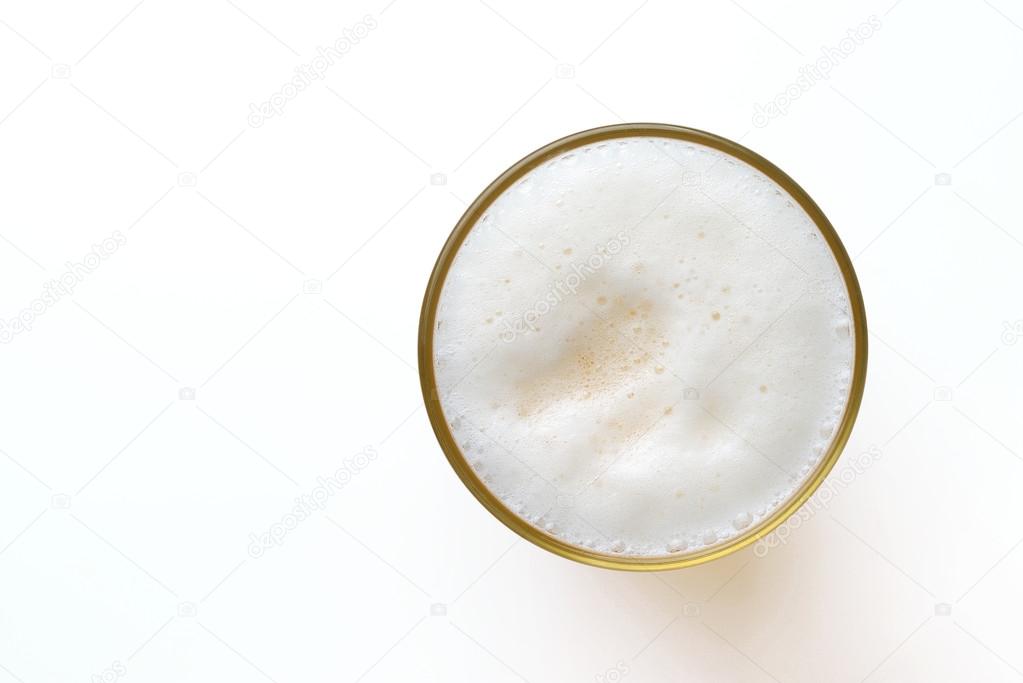 froth of beer in glass