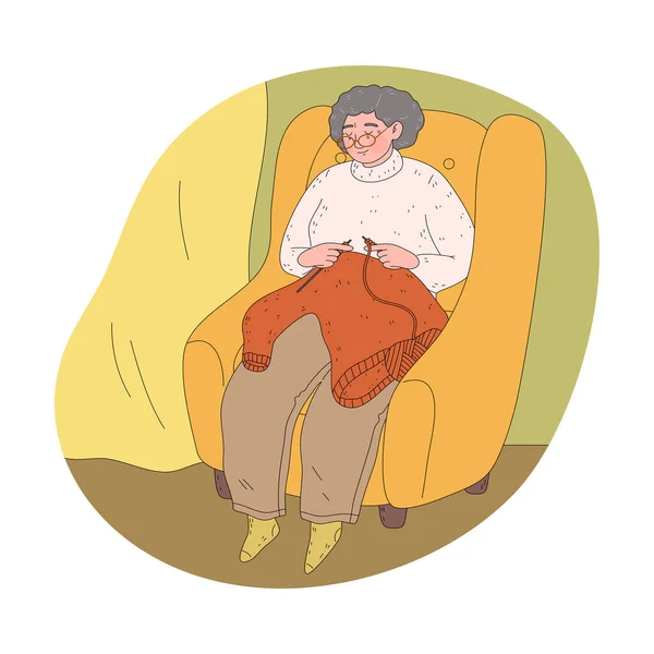 Grootmoeder in bril zittend in fauteuil thuis en breiend warme trui — Stockvector