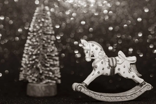 Dondolo Cavallo Giocattolo Natale Albero Natale Sfondo Nero Glitter Seppia — Foto Stock