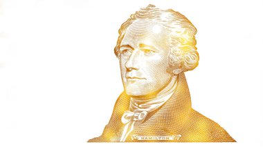 Altın desenli Alexander Hamilton, beyaz arka planda izole edilmiş 10 dolarlık banknotu kesti.