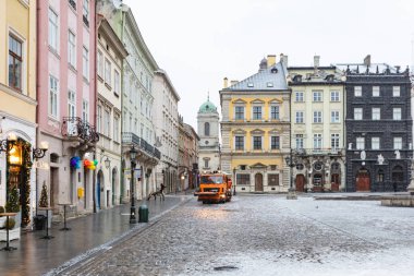 Lviv, Ukraine - January 10, 2021: Empty Lviv streets during COVID-19 Quarantine. Market square in Lviv clipart
