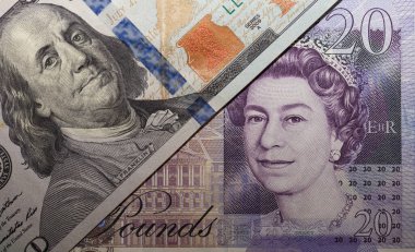 100 dolarlık banknot ve tasarım amaçlı 20 sterlinlik banknot.