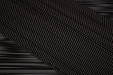 Siyah spagetti arka planı. Spagetti mürekkep balığı mürekkebi 