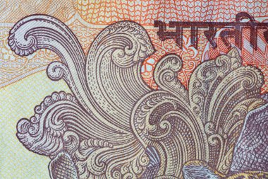 Tasarım amacıyla eski 10 Hint Rupisi 'nin bir parçası.