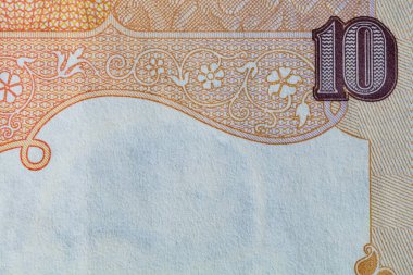 Tasarım amacıyla eski 10 Hint Rupisi 'nin bir parçası.