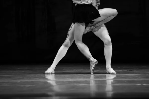 Closeup of classic ballet couple on stage
