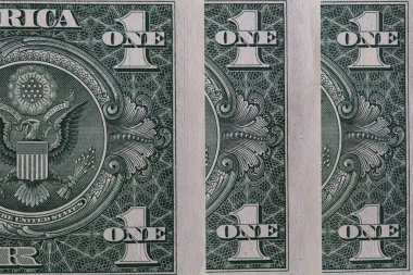 1 Amerikan doları banknotları, ters çevirin.