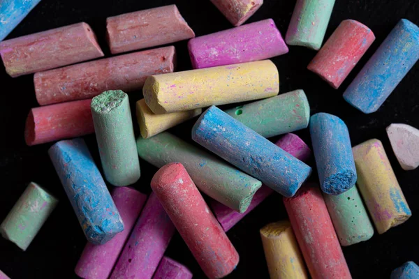 Pieces Of Colored Chalk And White Chalk Stock Photo, Picture and Royalty  Free Image. Image 94042116.