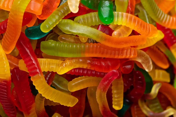 Multicolored Jelly Worm Candies Textured Background — Stock Photo, Image