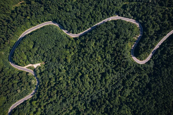 Aerial view on mountain road from drone