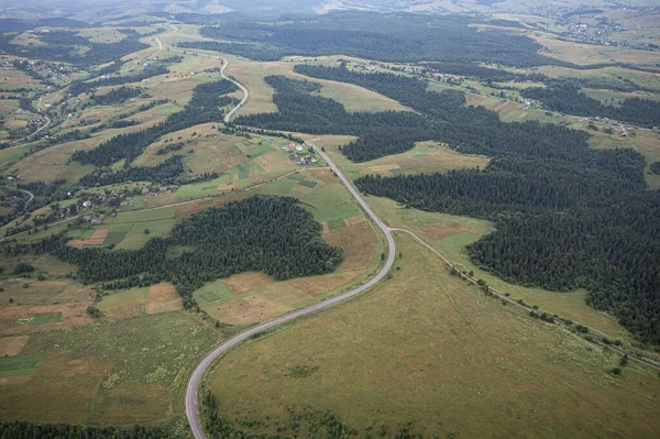 Aerial view on mountain road from drone