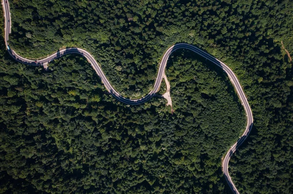 Aerial view on mountain road from drone