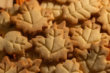 Homemade Autumn Leaf Cookies on an Orange Pumpkin Plate