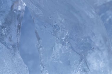 Işıl ışıl mavi buz kristalinin makro dokusu