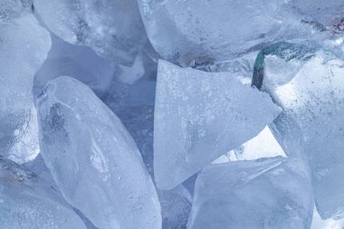 Işıl ışıl mavi buz kristalinin makro dokusu