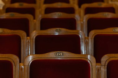 Row of red seats in theatre for design purpose