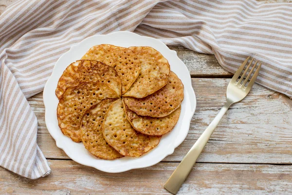 Homemade gluten-free pancakes made from rice, corn and buckwheat flour.