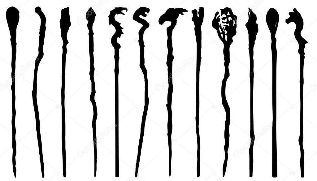 Magic staff silhouettes on the white background