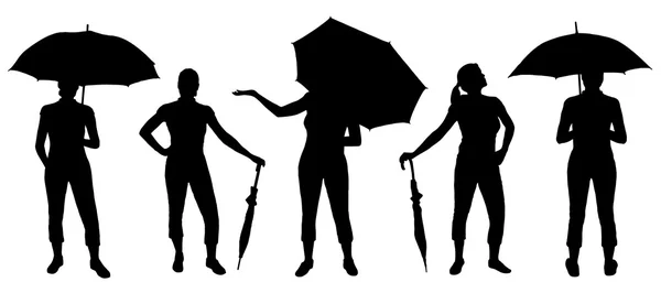 Silhouettes parapluie femmes — Image vectorielle