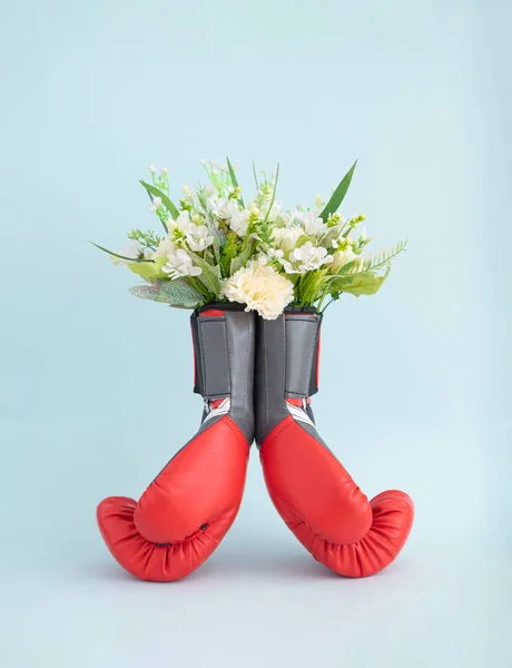 Spring Flower Bouquet Red Boxing Gloves Minimal Blue Background Strong Stock Picture