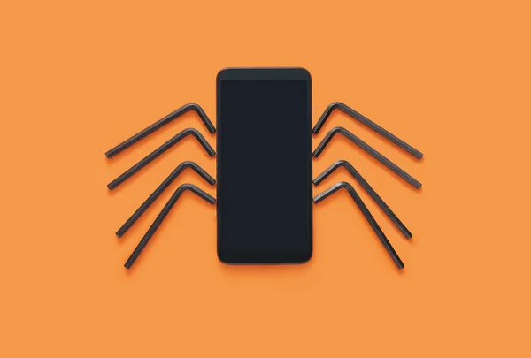 電話とクモに配置16進キーツール 楽しいハロウィンモックアップのアイデア ロイヤリティフリーのストック画像