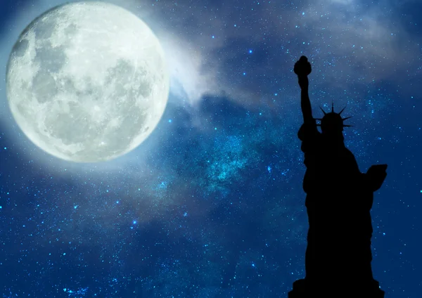 Silhouette Statue of Liberty on full moon night