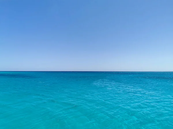 Clean sea water in sunny afternoon. Calm weather on the Red sea area. Atmospheric background picture