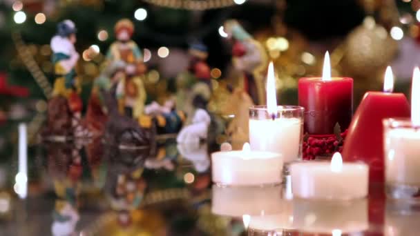 Natal presépio cena com velas — Vídeo de Stock