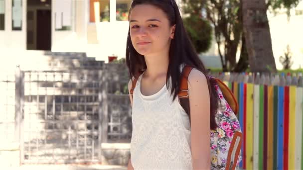 Young girl with backpack is going back to school — Stock Video