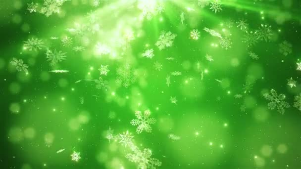 Зеленые красивые падающие снежинки — стоковое видео
