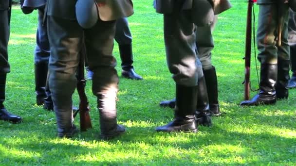 Soldiers feet with military uniform on field — Stock Video