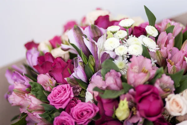 Beautiful bright bouquet with roses, parrot flowers and chrysanthemum — Stock Photo, Image