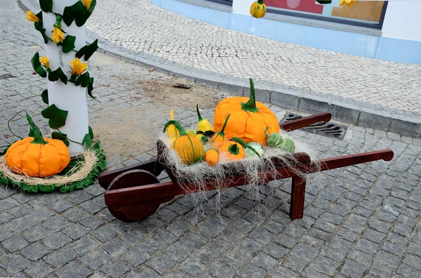 Pumpkins  paper and wheelbarrow — Stock Photo, Image